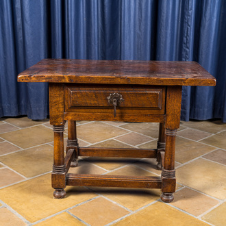 A walnut and oak side table with a drawer, 17th C. and later