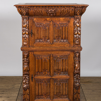 A Gothic Revival oak two-door cupboard with linenfold panels, 19th C. with older elements