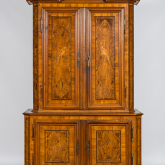 A German marquetry four-door 'deux-corps' cabinet with flowers and parrots, 18th C.