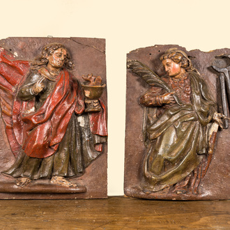 A pair of polychrome wooden reliefs depicting saints, 17th C.