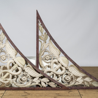 A pair of large faux porphyry and white patinated wooden corner ornaments with aesculapons, 19/20th C.