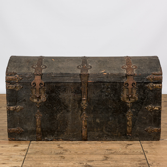 A wooden wrought-iron mounted 'bahut' trunk with leather upholstery, 18/19th C.
