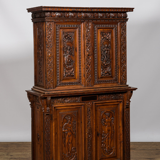 A richly carved walnut 'deux-corps' cabinet with Hermes and Aphrodite, 19th C.