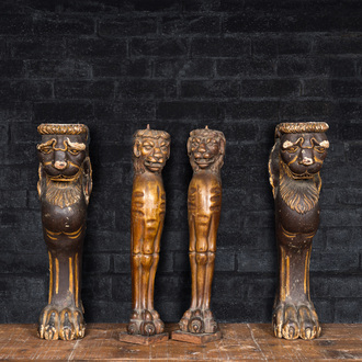 Two pairs of sculpted wooden table legs in the shape of lions, 19th C.