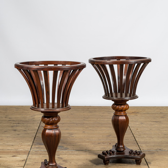 A pair of English Regency-style mahogany plant stands, 19th C.