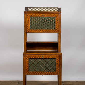 A bronze mounted mahogany cabinet with parquetry, 19th C.