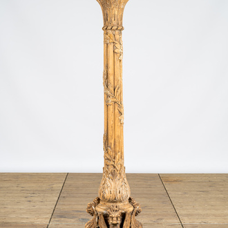 A large wooden column resting on dragon feet, 19th C.
