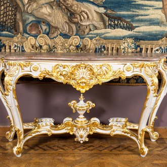 An attractive partly gilt wooden console table with marble top, Italy, 19th C.