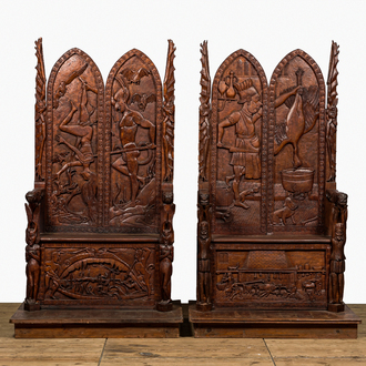 A pair of imposing wooden throne seats with relief design, 20th C.
