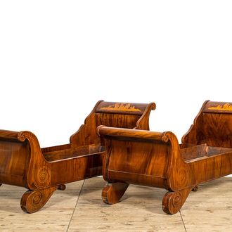A pair of French mahogany beds or 'lits en bateau', 19th C.
