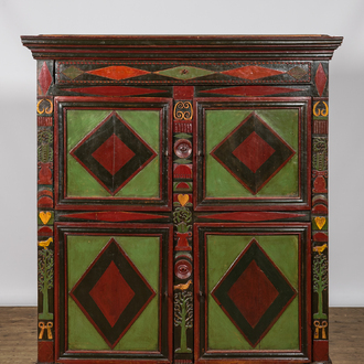 A polychrome wooden four-door cupboard, Alsace, 1st half 19th C.