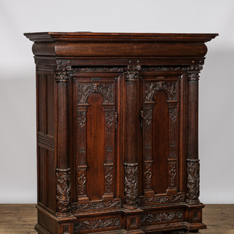 A Dutch oak two-door 'keeftkast' cupboard, 17th C. with later elements