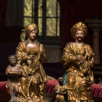 A pair of polychromed and gilt terracotta figures of a Moorish couple playing music, Italy, 18/19th C.