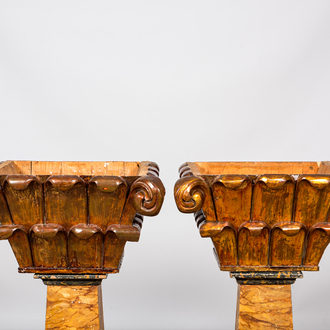 A pair of gilt and lacquered wooden Corinthian capitals, 19th C.