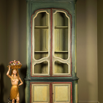 A large polychromed oak display cabinet, 18th C.