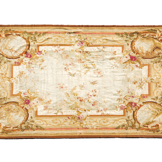 A large French Aubusson rug with floral design and landscapes, 19th C.