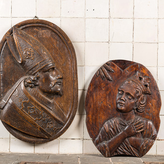 Two oval wooden medallions with a bishop and the annunciation, 17/18th C.