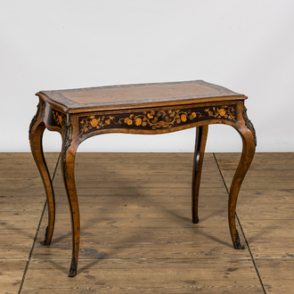 A French Louis XV-style bronze mounted floral marquetry side table, 19th C.