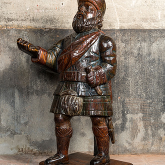 A polychrome wooden figure of a Scottish nobleman, 19th C.