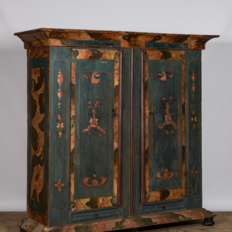 A German polychrome wooden linen cupboard, dated 1765, 18/19th C.