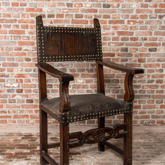 A Spanish walnut chair with leather upholstery, 17th C.
