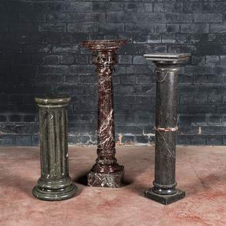 Two marble stands and one faux-marble-painted wooden stand, 19/20th C.