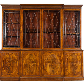 A large English magohany four-door break fronted library bookcase, 19th C.