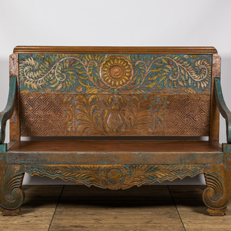 A large Indian polychrome wooden couch with floral design, 20th C.