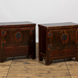 A pair of Chinese lacquered elm cabinets, 20th C.