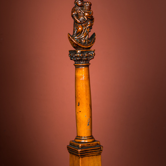 A walnut Madonna and Child on the crescent moon on a Corinthian column, 17/18th C.