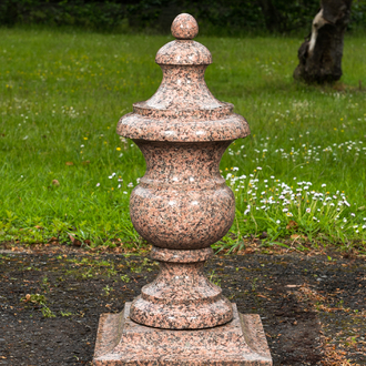 A red granite decorative vase, 20th C.