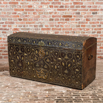 A French wooden 'bahut' trunk with leather upholstery and partly studded gilt copper mounts, 17th C.