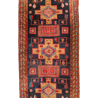 A large rectangular ornamental Meshkin rug, Northwest-Persia, 19/20th C.
