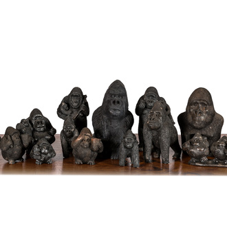 A large collection of wooden and polystone gorilla sculptures, 20th C.