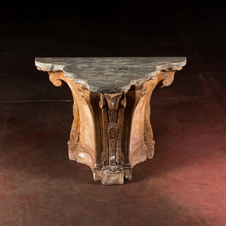A patinated plaster console with patinated wooden top, 20th C.