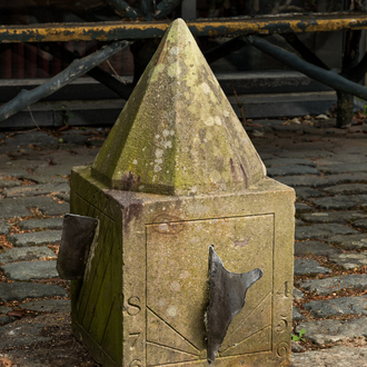 A carved stone sundial with lead indicators, 19th C.