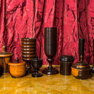 A varied collection of vases and boxes with covers in various types of wood, 20th C.