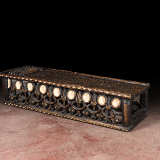 A Bamileke patinated wooden richly decorated bed, Cameroon, 20th C.