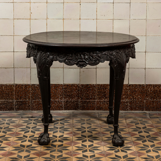 A carved and patinated wooden side table with mascarons in neobaroque-style, 19th C.