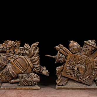 A pair of oak reliefs with Christian symbolism, 18th C.