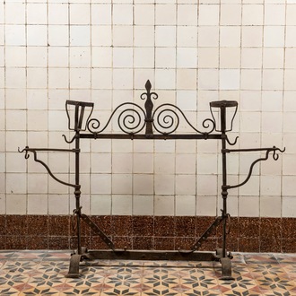 A Gothic Revival wrought iron andiron or firescreen, 19th C.