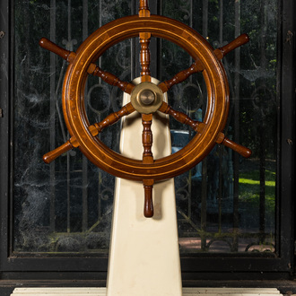A wooden steering wheel of a boat, 20th C.