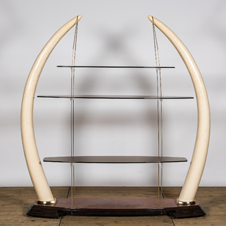 A large étagère with glass shelves set in faux ivory tusks, 20th C.