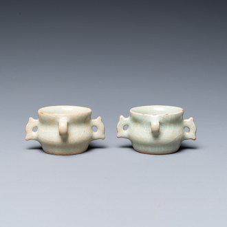 A pair of Chinese Longquan celadon bird feeders, Ming