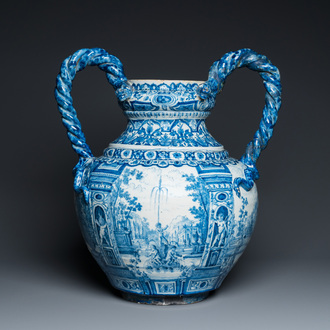 A large Dutch Delft blue and white vase depicting a country house, 1st quarter 18th C.