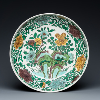 A rare Chinese biscuit-enamelled sancai dish with anhua dragon design, Kangxi mark and of the period