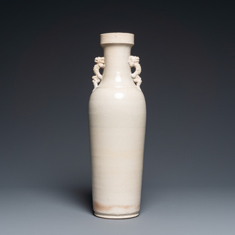 A Chinese monochrome Swatow vase with dragon handles, Transitional period