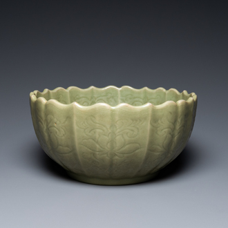 A large Chinese Longquan celadon bowl with underglaze lotus design, Ming