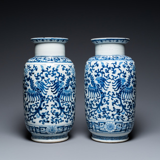 A pair of Chinese blue and white 'phoenix' vases, Kangxi mark, 19th C.