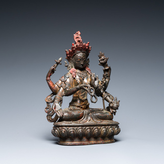 A Sino-Tibetan gilt-lacquered bronze Vasudhara, 17th C.